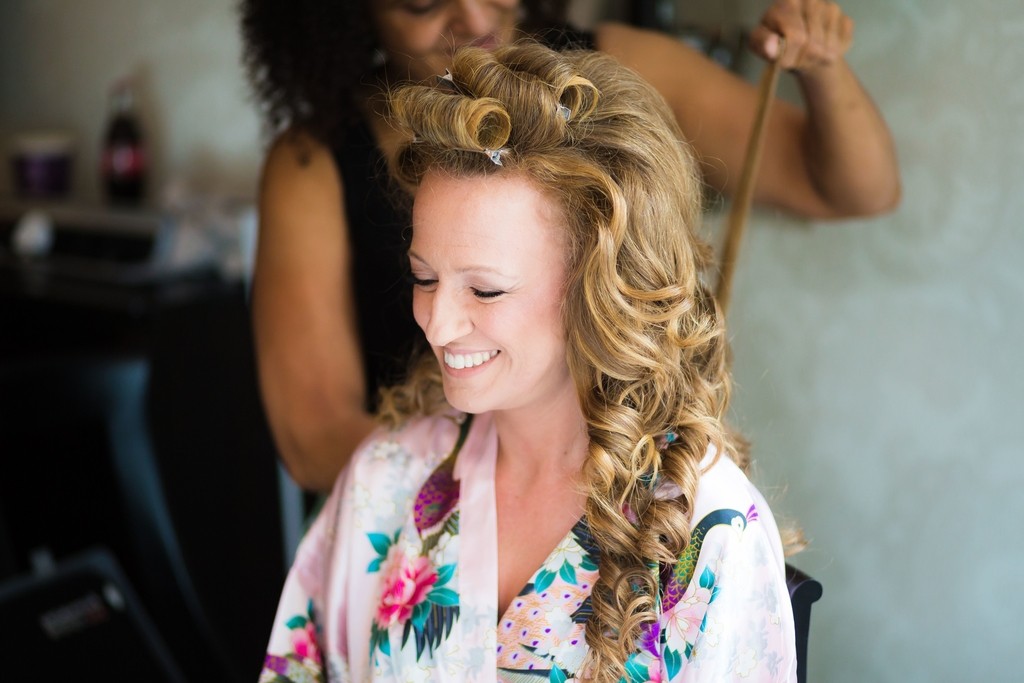 Bridal makeup for a bride, plus bridal hairstyles for brides with long, thick, heavy hair with natural curls by wedding makeup artist and bridal hair stylist Pam Wrigley at the St Ermin Hotel