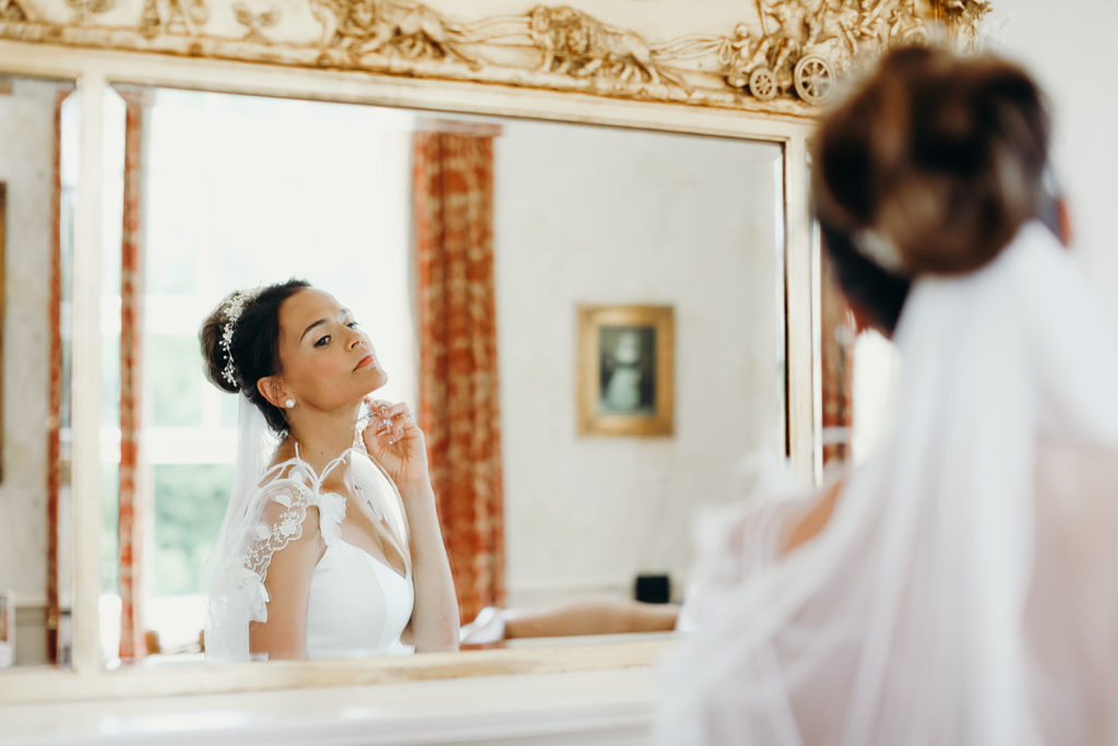 high bun wedding hairstyle and natural bridal makeup by Pam Wrigley
