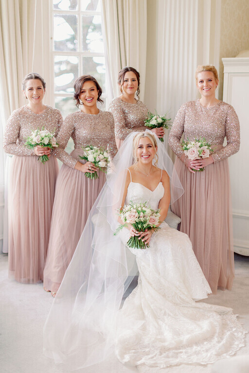 bridal low bun hair style and wedding hairstyle and for bride and bridesmaids by Pam Wrigley at Hedsor House