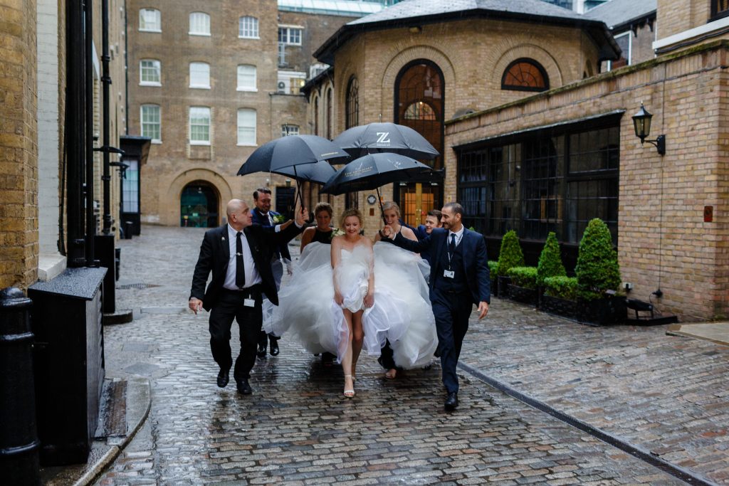 bridal hair and wedding day makeup in the rain