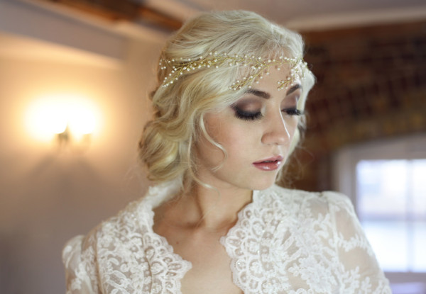 Soft relaxed, braided low bun hairstyle and smoky makeup for a bride. Created by Pam Wrigley bridal hairstylist and wedding makeup artist, London.
