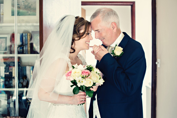 Natural makeup and soft messy low bun hairstyle for a bride. Created by Pam Wrigley bridal hairstylist and wedding makeup artist, London.