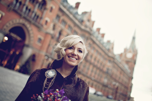 Smokey vintage makeup and soft messy vintage low bun hairstyle for a bride. Created by Pam Wrigley bridal hairstylist and wedding makeup artist, London.