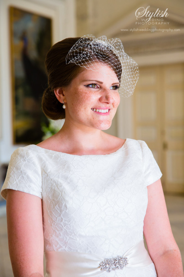 Vintage bun wedding day hair style and natural, vintage wedding makeup for a bride. By Pam Wrigley wedding makeup artist and bridal hair stylist.