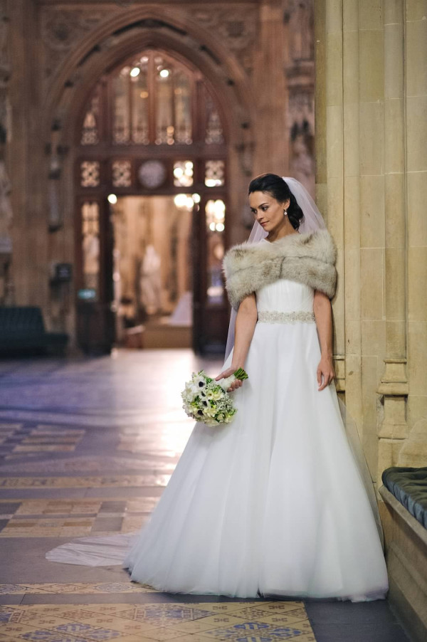 wedding dress. wedding makeup and bridal hair in a soft low bun hairstyle. By Pam Wrigley wedding makeup artist and bridal hair stylist, Westminster Abbey London.