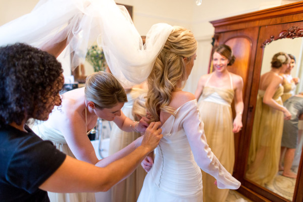 Wedding natural makeup and bridal hair in a half up hairstyle for a bride. By Pam Wrigley wedding makeup artist and bridal hair stylist, London.