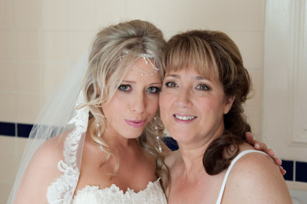 Wedding smokey makeup and bridal hair in a half up hairstyle for a bride. By Pam Wrigley wedding makeup artist and bridal hair stylist, London.