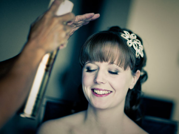 Wedding smokey makeup and bridal hair in a low bun hairstyle for a bride. By Pam Wrigley wedding makeup artist and bridal hair stylist, London.