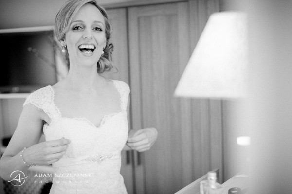 Wedding natural makeup and bridal hair in a messy, low, side bun hairstyle for a bride. By Pam Wrigley wedding makeup artist and bridal hair stylist, London.