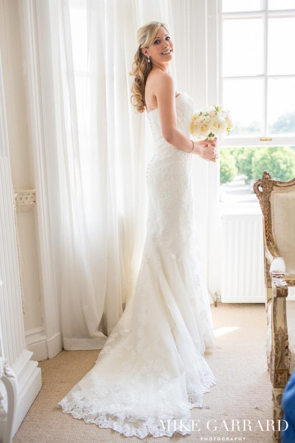 Beautiful natural bridal makeup and hair for the bride by Pam Wrigley. Plus half up wedding hairstyle for long hair by wedding makeup artist and bridal hair stylist in London.