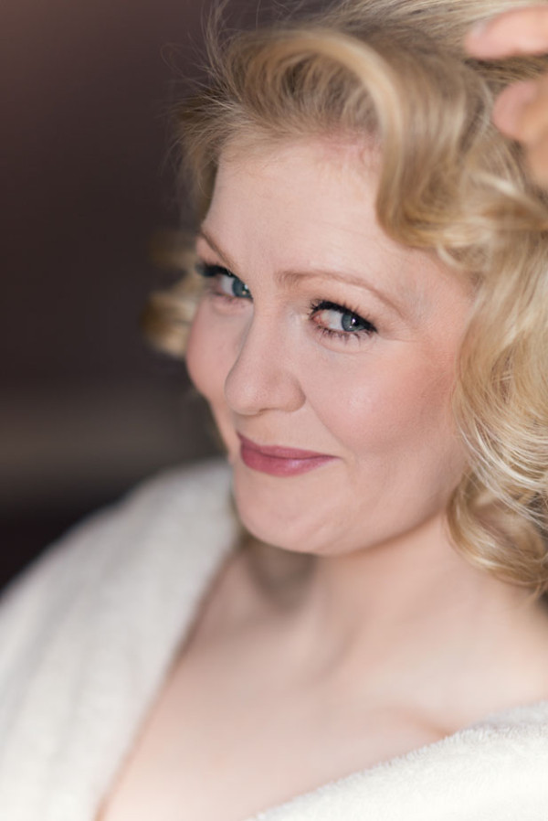 Wedding vintage makeup and bridal hair in a low bun vintage hairstyle for a bride. By Pam Wrigley wedding makeup artist and bridal hair stylist, London.