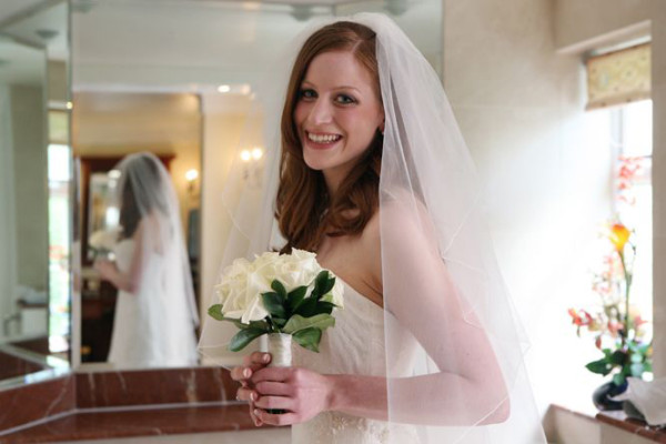Wedding natural makeup and bridal hair in a soft hair down hairstyle for bride. By Pam Wrigley wedding makeup artist and bridal hair stylist, London.