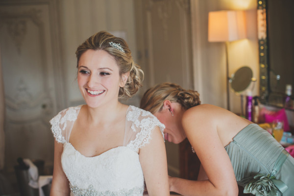 Wedding natural makeup and bridal hair in a soft low bun hairstyle for bride. By Pam Wrigley wedding makeup artist and bridal hair stylist, London.