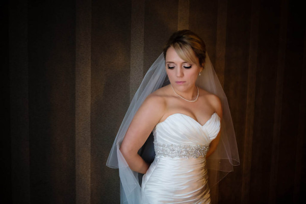 Wedding natural makeup and bridal hair in a soft low bun hairstyle for bride. By Pam Wrigley wedding makeup artist and bridal hair stylist, London.