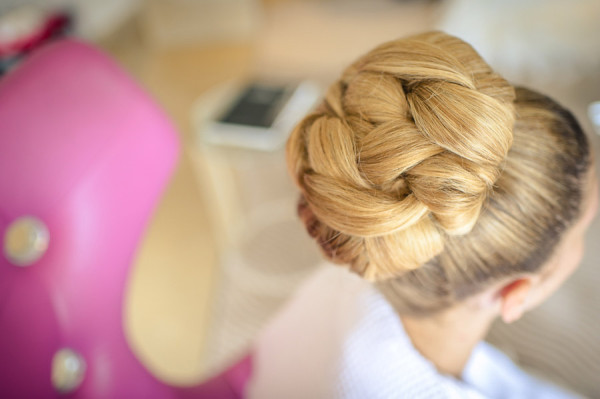 Wedding vintage makeup and bridal hair in a textured high bun hairstyle for bride. By Pam Wrigley wedding makeup artist and bridal hair stylist, London.