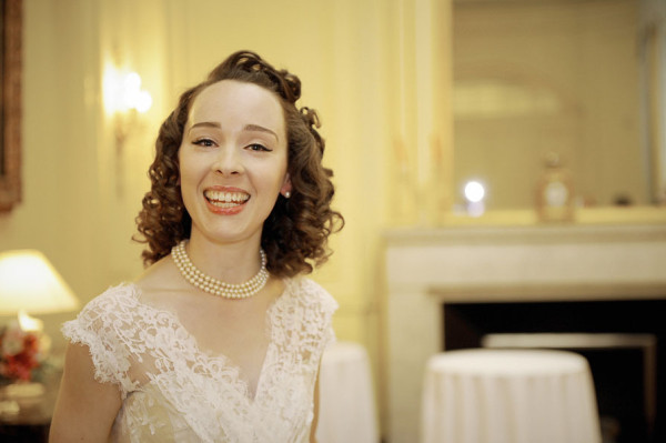 Wedding vintage makeup and bridal hair in a half up hairstyle for bride with soft natural curls. By Pam Wrigley wedding makeup artist and bridal hair stylist, London.