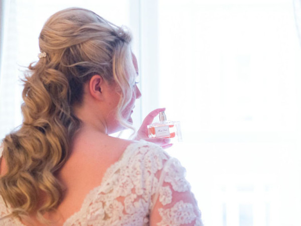 Wedding vintage makeup and bridal hair in a half up hairstyle for bride with soft curls. By Pam Wrigley wedding makeup artist and bridal hair stylist, London.