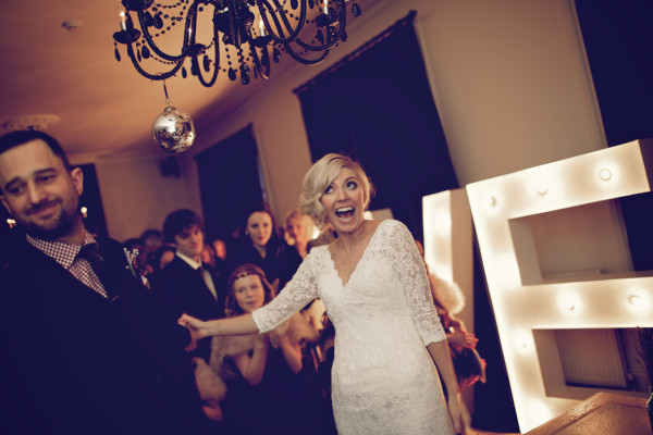 Wedding vintage makeup and bridal hair in a soft low bun hairstyle. By Pam Wrigley wedding makeup artist and bridal hair stylist, London.