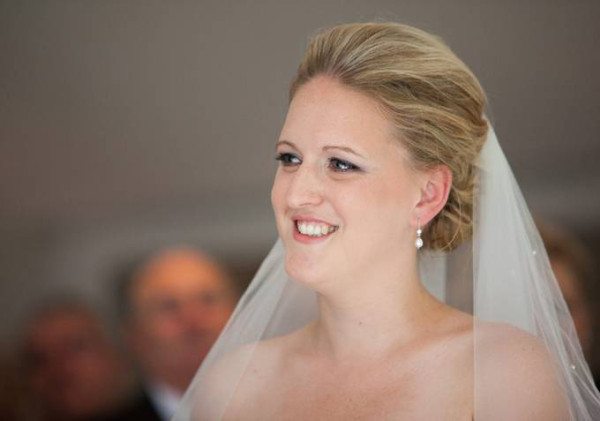 Wedding natural makeup and bridal hair in a soft low bun hairstyle for short hair. By Pam Wrigley wedding makeup artist and bridal hair stylist, London.