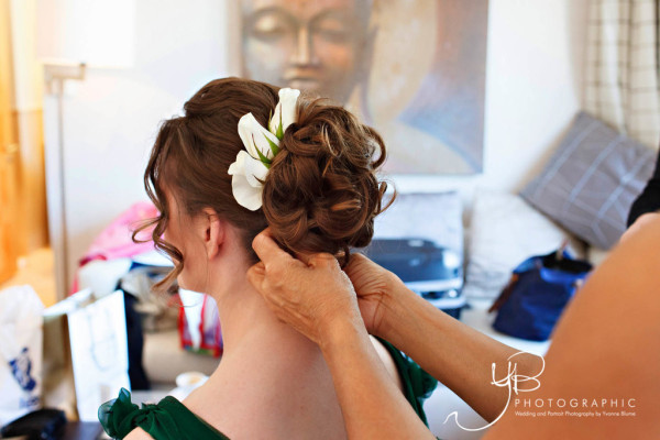 Natural bridal makeup and bridal low bun hairstyles for mature brides with medium length hair. Plus makeup by wedding makeup artist and bridal hair stylist Pam Wrigley in London.