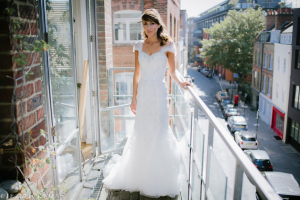 Smokey bridal makeup and bridal half up hairstyles for brides with medium length hair. Plus makeup by wedding makeup artist and bridal hair stylist Pam Wrigley in London.