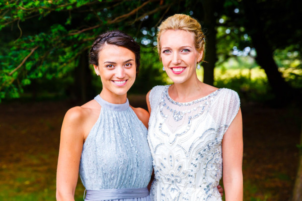 Natural bridal makeup and braided, bridal low bun hairstyles for brides with long hair. Plus makeup by wedding makeup artist and bridal hair stylist Pam Wrigley in Sussex