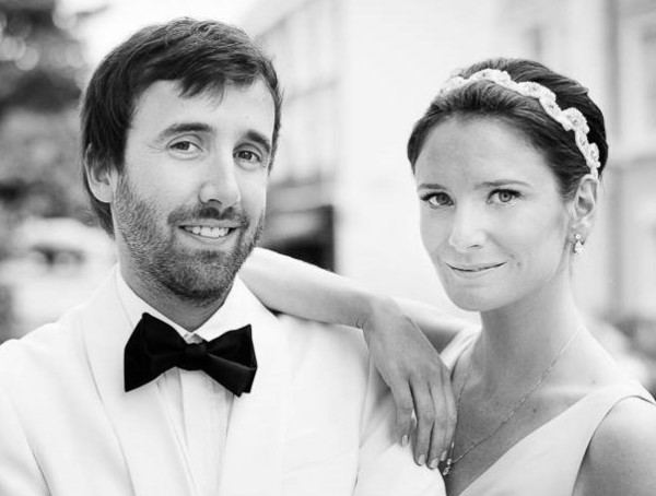 Beautiful natural bridal makeup and hair for the bride by Pam Wrigley. Plus messy low bun with braids wedding hairstyle for short hair by wedding makeup artist and bridal hair stylist in London.