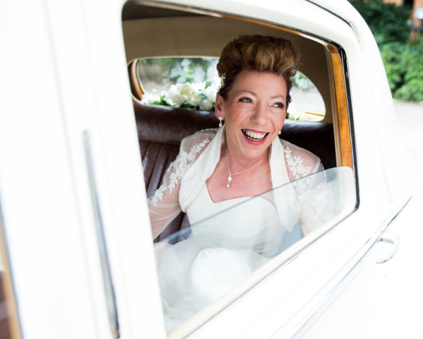 Beautiful smokey bridal makeup for mature bride by Pam Wrigley. Plus wedding hairstyle for short hair wedding by makeup artist and bridal hair stylist in London. mature brides