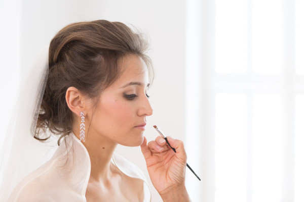 Bridal makeup and hair for a bride. Plus bridal hairstyles for brides with long hair by wedding makeup artist and bridal hair stylist Pam Wrigley in London