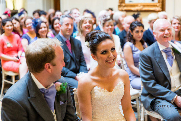 Smoky bridal makeup and bridal high bun hairstyles for brides with medium length hair. Plus makeup by wedding makeup artist and bridal hair stylist Pam Wrigley in London.