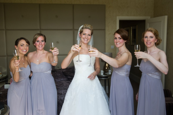 wedding photos. Natural bridal makeup and hair down bridal hairstyles for brides with short hair. Plus makeup by wedding makeup artist and bridal hair stylist Pam Wrigley in London.