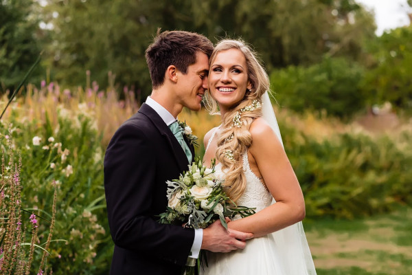 wedding braided hairstyle and smoky bridal makeup by Pam Wrigley London