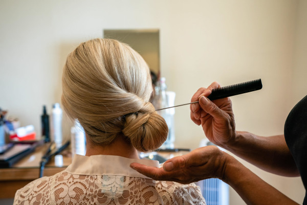 low bun bride wedding bridal hair natural makeup Farnham castle