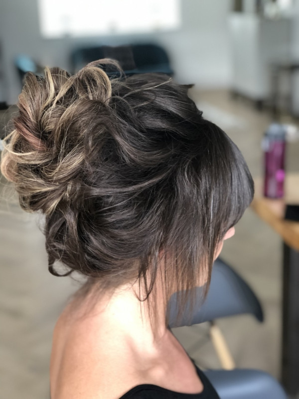 soft messy up do bridal.wedding high bun hairstyle pam wrigley with extensions