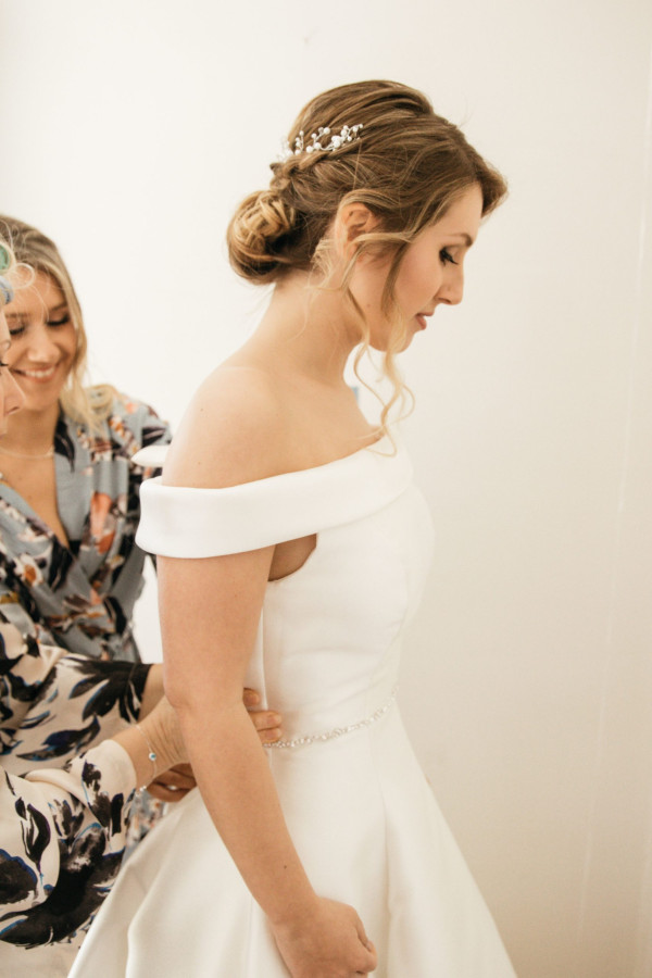 soft smoky bridal wedding makeup and hair by Pam Wrigley London Surrey individual lashes lash extensions soft low bridal bun hairstyle