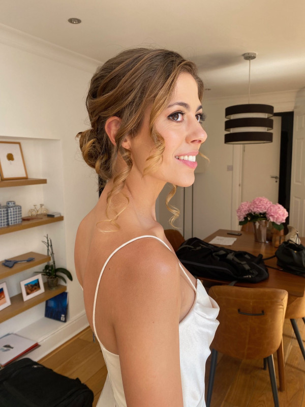 wedding and bridal hairstyles messy low bun by Pam Wrigley
