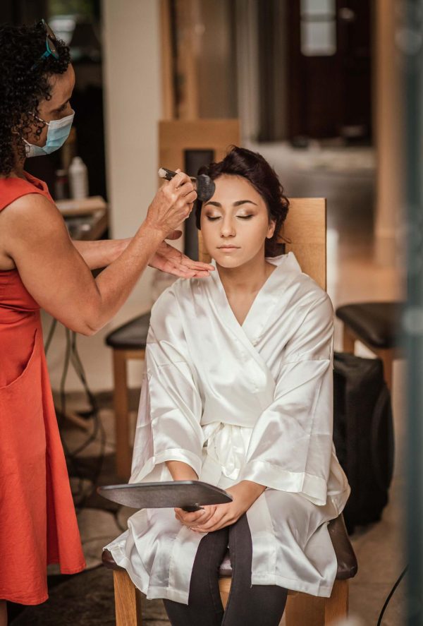 wedding high tumbling bun hair style and bridal Pam Wrigley Hair and Makeup Contact page