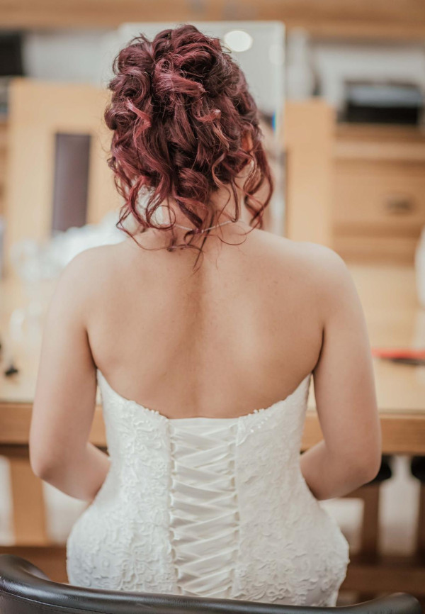 wedding high tumbling bun hair style and bridal makeup by Pam Wrigley