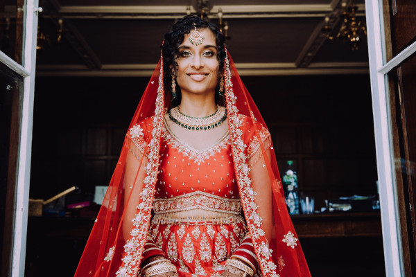 South Asian Wedding makeup and natural curls bridal hairstyle by Pam Wrigley