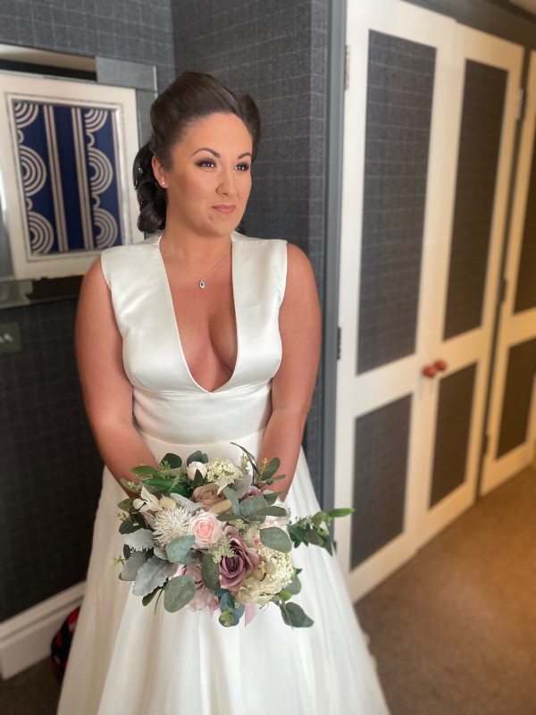 bridal icon vintage wedding makeup and soft low bun bridal hairstyle by Pam Wrigley