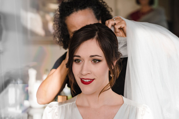 vintage wedding makeup and soft low bun bridal hairstyle by Pam Wrigley